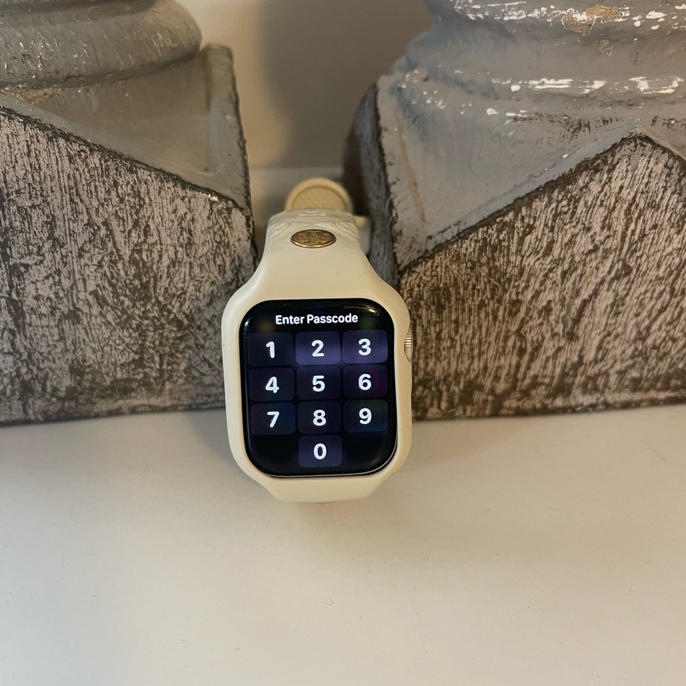 Tory Burch Cream Smartwatch with Elegant Design